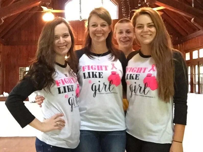 girls wearing matching shirts for support