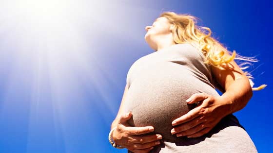 pregnant women iin the sun