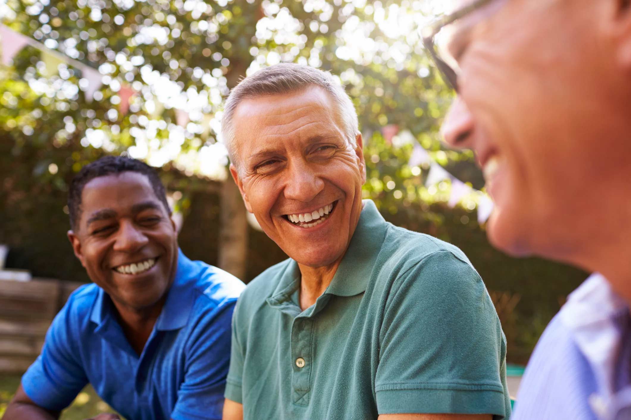 three men laughing
